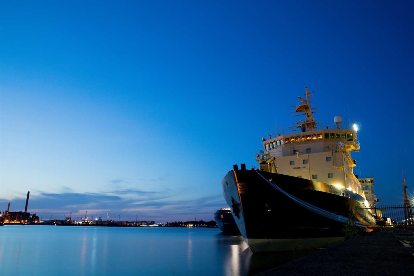 ship docked at shore