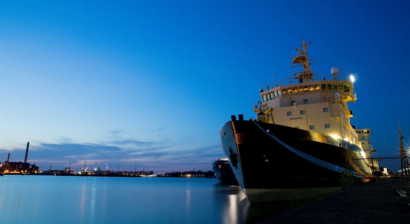 ship docked at shore